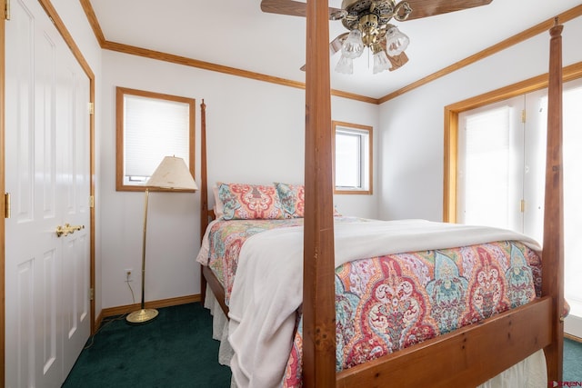 carpeted bedroom with ceiling fan and crown molding