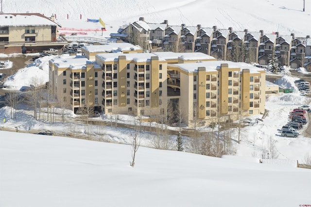 view of snow covered building