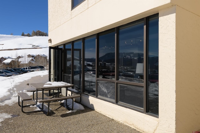 view of snow covered patio