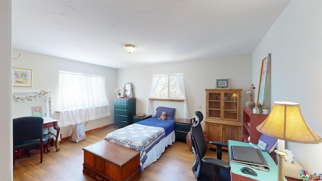 bedroom featuring light hardwood / wood-style flooring