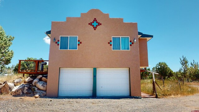 exterior space with a garage