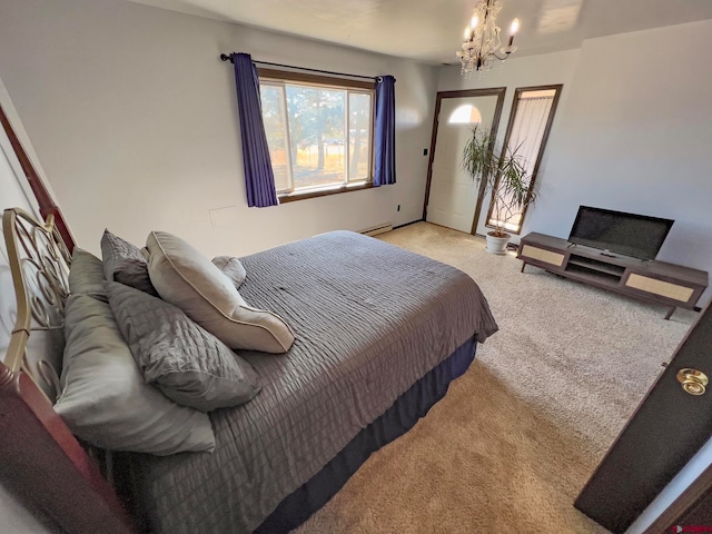 carpeted bedroom with an inviting chandelier and baseboard heating