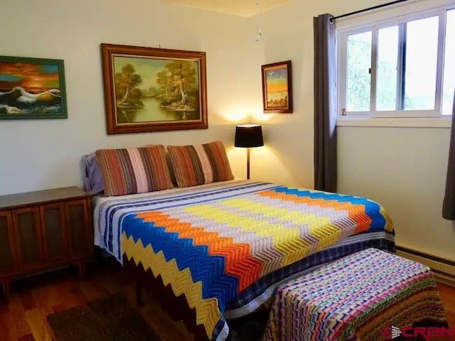 bedroom featuring dark hardwood / wood-style floors