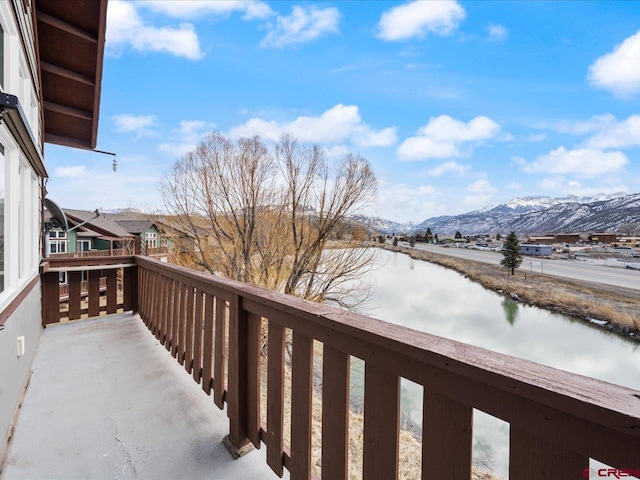 balcony featuring a mountain view