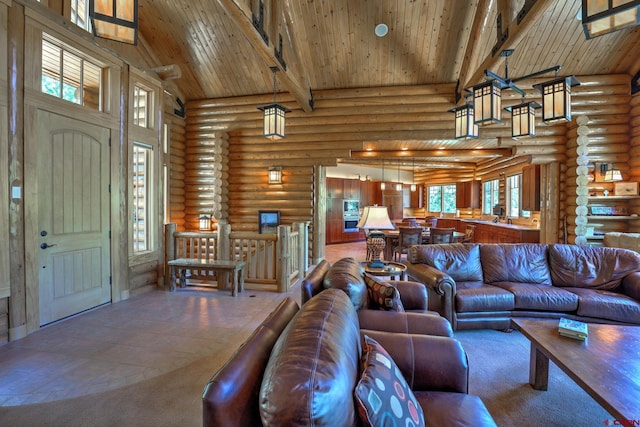 tiled living room with rustic walls, beam ceiling, high vaulted ceiling, and wood ceiling