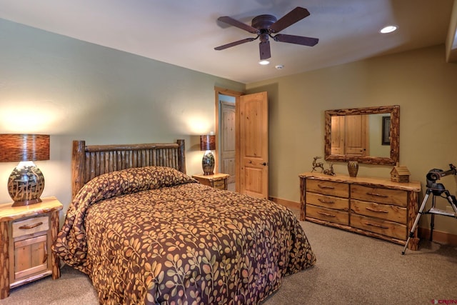 bedroom featuring light carpet and ceiling fan