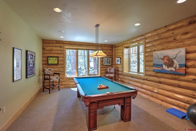 rec room featuring carpet flooring, rustic walls, and pool table