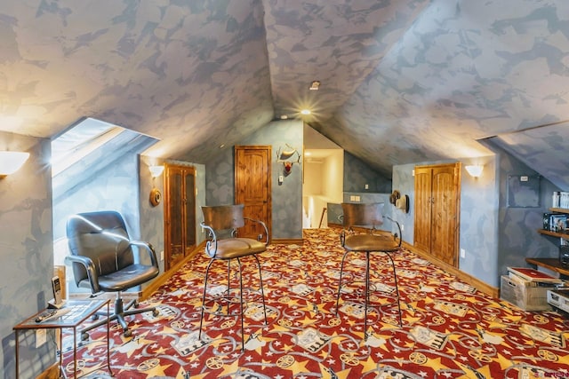 bonus room featuring lofted ceiling and light colored carpet