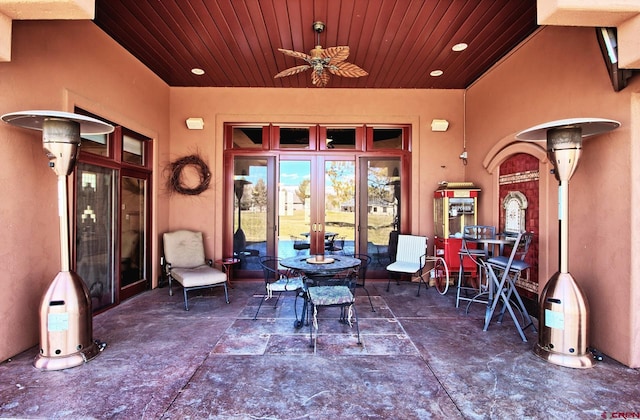 view of patio / terrace featuring french doors and ceiling fan