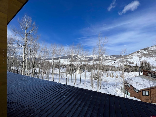 view of snow covered deck