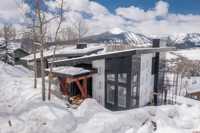 exterior space featuring a mountain view