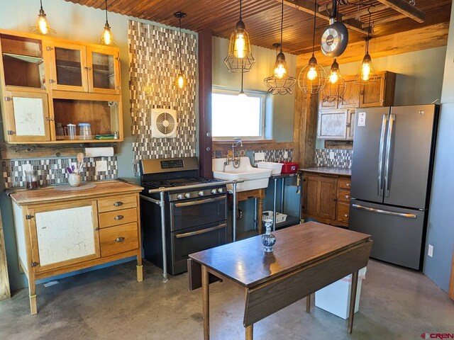 kitchen featuring appliances with stainless steel finishes, pendant lighting, backsplash, sink, and wood ceiling