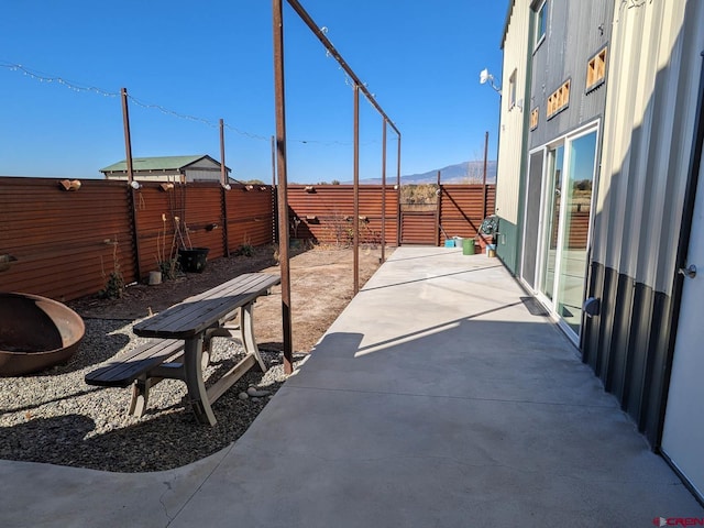 view of terrace with a mountain view