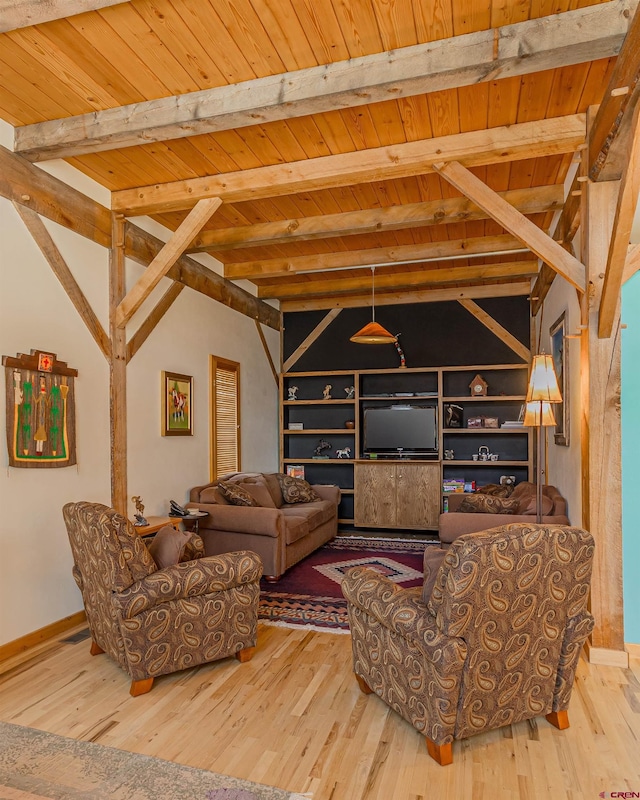 living room featuring wooden ceiling, light hardwood / wood-style floors, and vaulted ceiling with beams