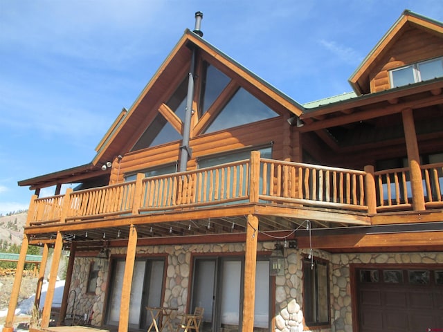 view of property exterior featuring a balcony