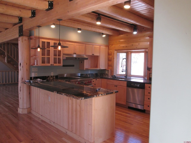 kitchen featuring decorative light fixtures, stove, stainless steel dishwasher, light wood-type flooring, and beam ceiling