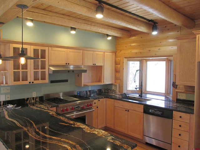 kitchen with light brown cabinetry, hanging light fixtures, beam ceiling, and stainless steel appliances