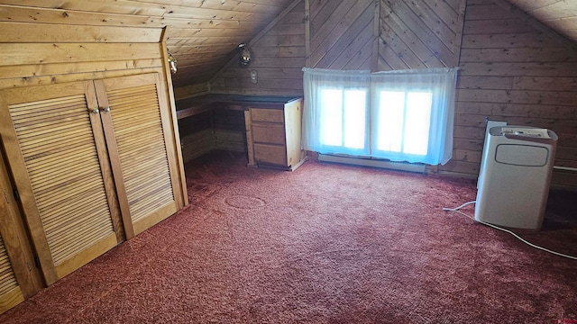 bonus room featuring wood ceiling, dark carpet, vaulted ceiling, and wooden walls