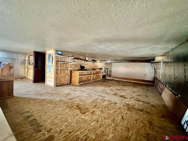 interior space with a textured ceiling