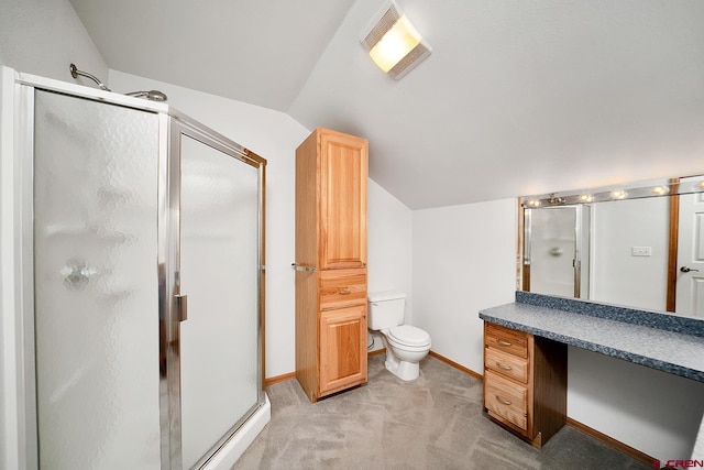 bathroom featuring an enclosed shower, toilet, vanity, and lofted ceiling