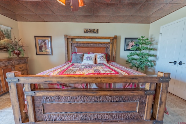 bedroom with light tile floors