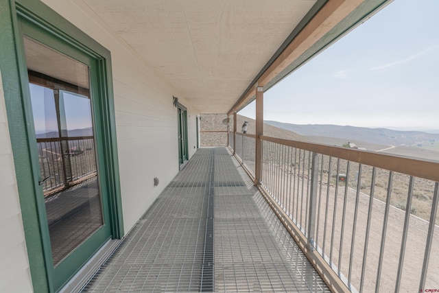 balcony featuring a mountain view