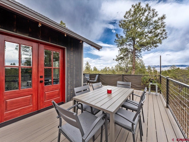 wooden terrace featuring french doors