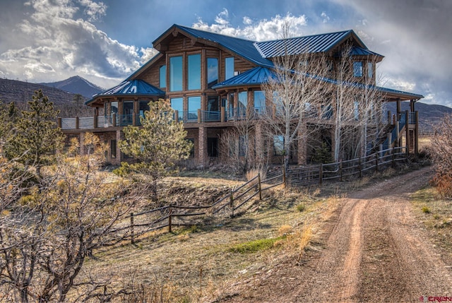 back of house with a balcony