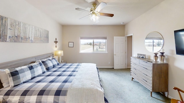 bedroom with ceiling fan and carpet floors