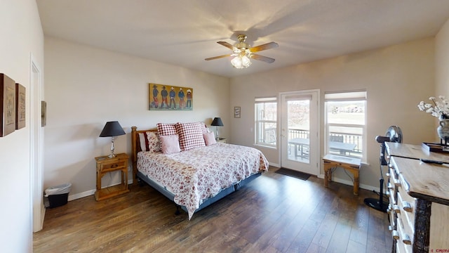 bedroom with access to outside, dark wood-type flooring, and ceiling fan