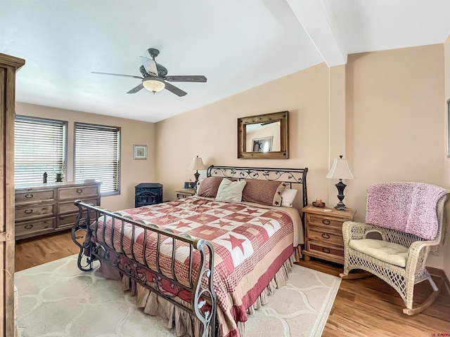 bedroom featuring ceiling fan and hardwood / wood-style flooring