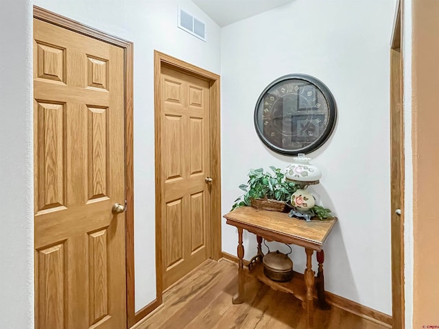 interior space with hardwood / wood-style flooring