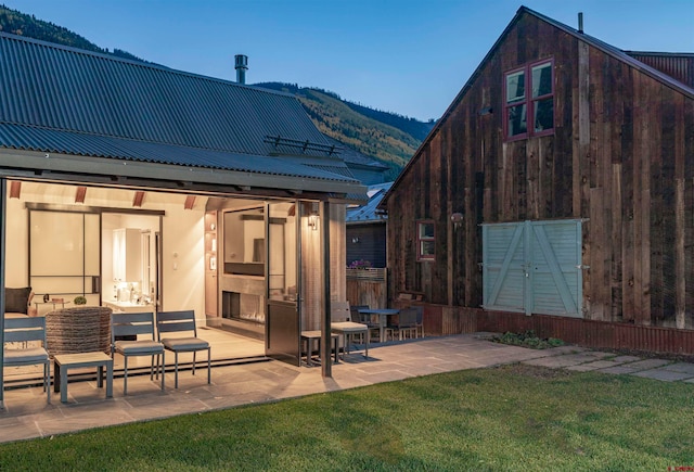 rear view of property with a patio area