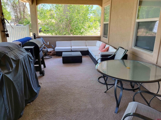 view of patio / terrace featuring a grill and an outdoor hangout area