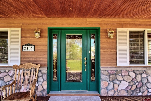 property entrance featuring covered porch