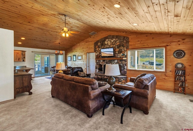 carpeted living room featuring lofted ceiling, wood ceiling, ceiling fan, and wood walls