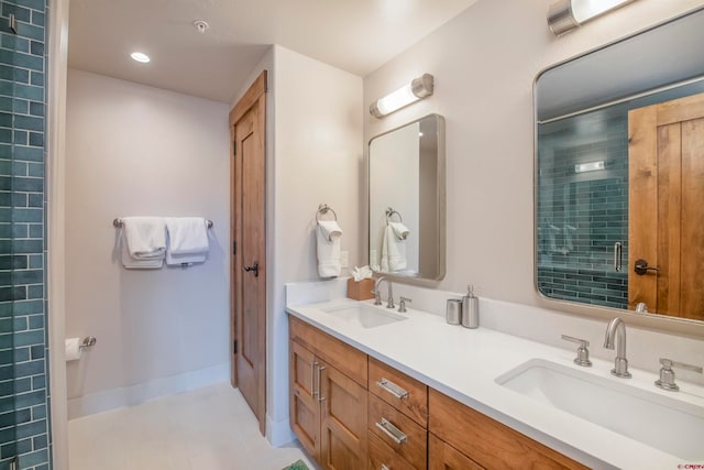 bathroom with tile flooring and double sink vanity