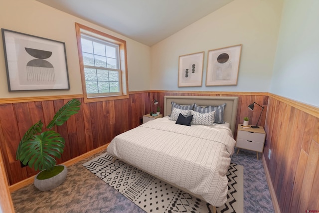 bedroom featuring carpet and vaulted ceiling