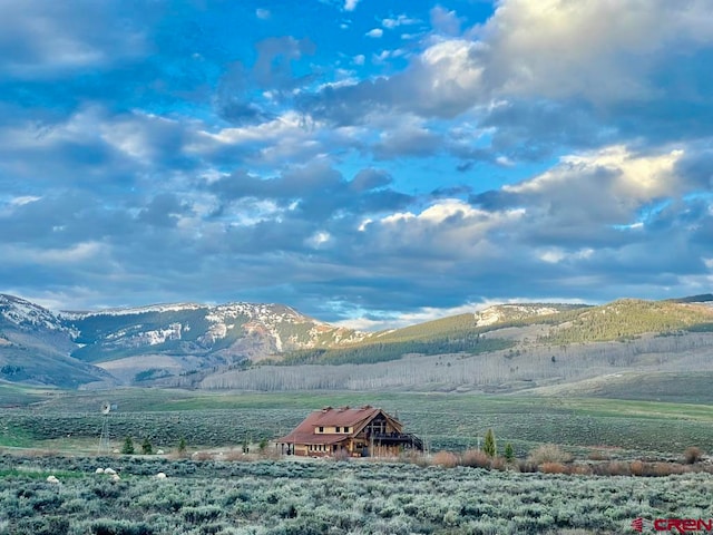 property view of mountains featuring a rural view