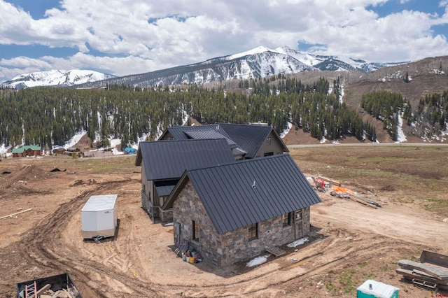 drone / aerial view featuring a mountain view