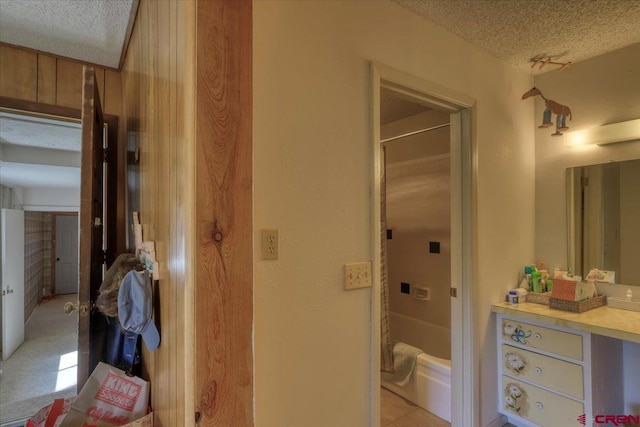 101 Spirit Path Ct, Pagosa Springs, CO 81147 - full bathroom featuring a textured ceiling, vanity, and shower / tub combination