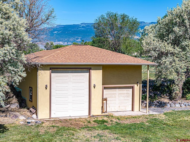 garage featuring a mountain view