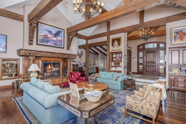 living room featuring beam ceiling, an inviting chandelier, dark hardwood / wood-style flooring, high vaulted ceiling, and a fireplace