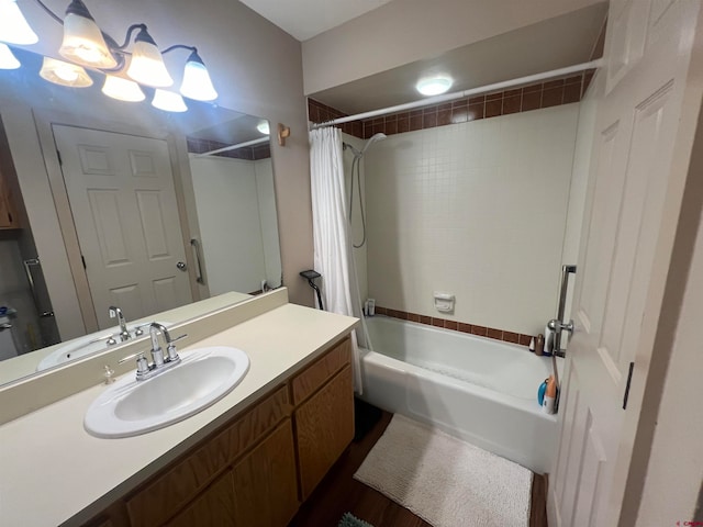 bathroom with shower / bath combo and vanity