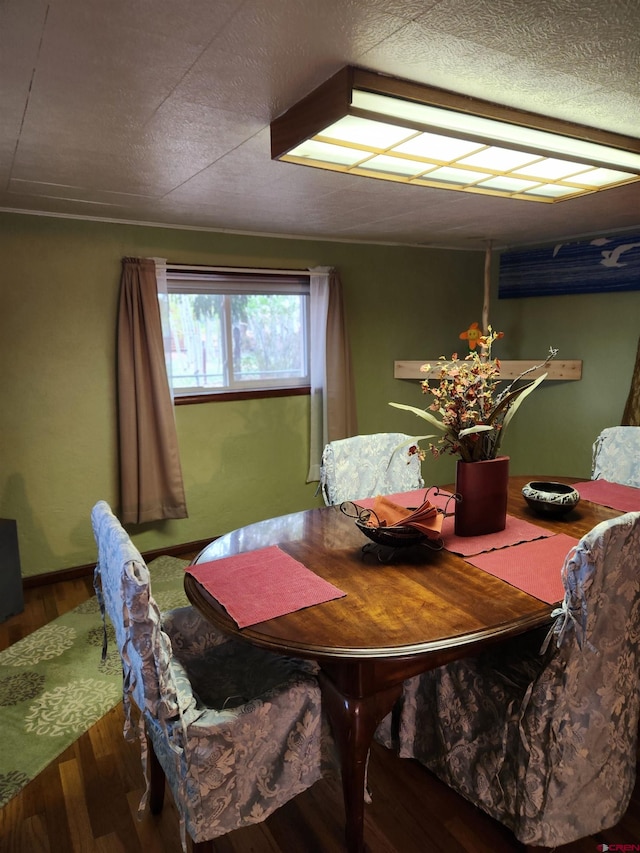 dining area featuring hardwood / wood-style floors