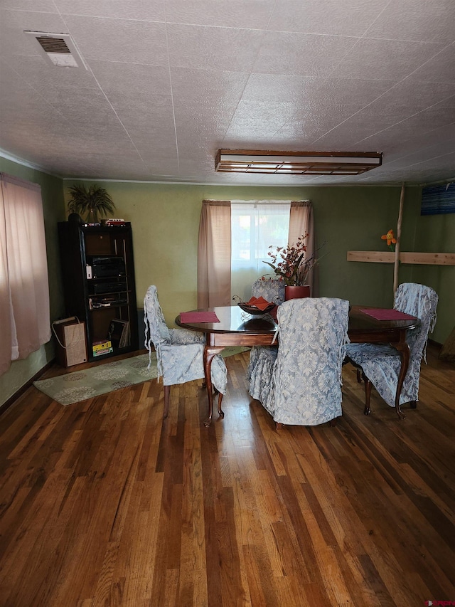 dining area featuring hardwood / wood-style floors