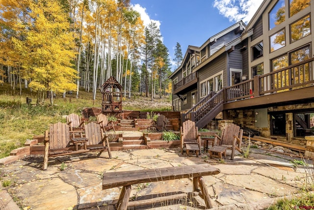 view of patio with a wooden deck