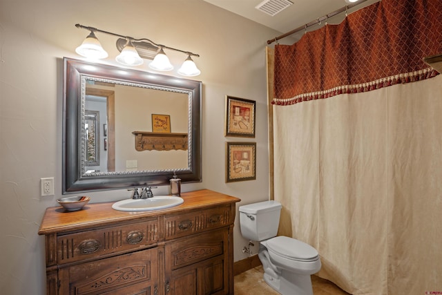 bathroom featuring a shower with curtain, vanity, and toilet