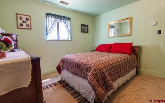 bedroom featuring carpet flooring