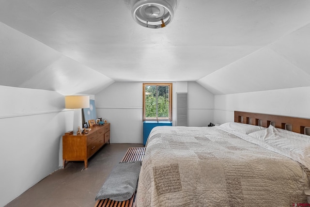 bedroom featuring vaulted ceiling